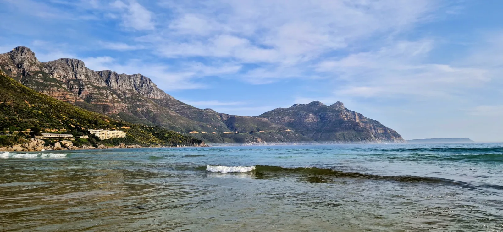 Hout Bay Beach looking towards Chapman's Peak on the Cape Peninsula