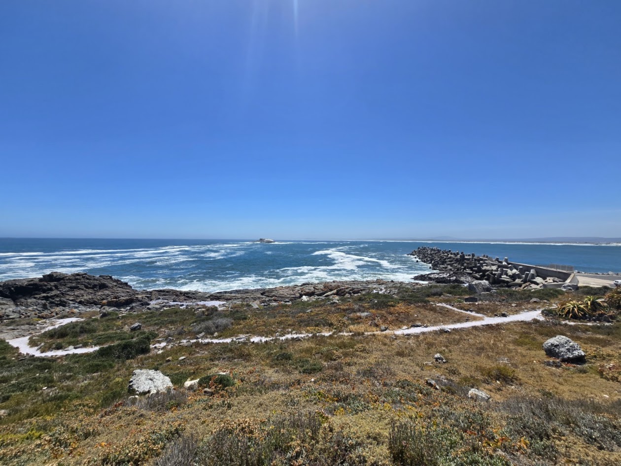 Yzerfontein harbour breakwater and rocky coastline